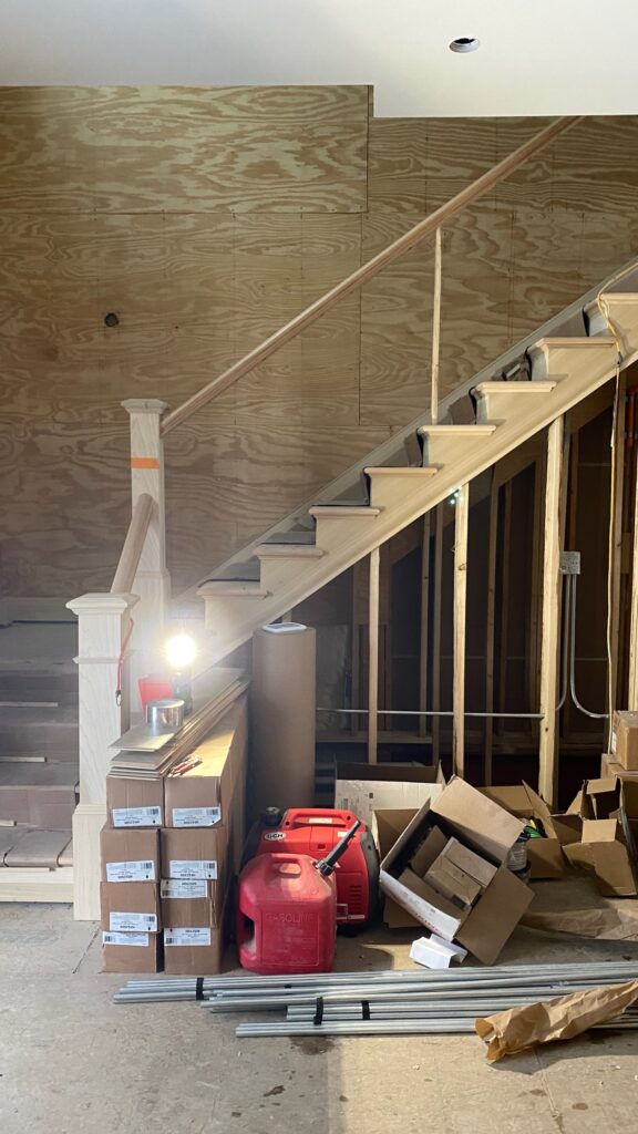 Mid-construction phase of foyer transformation.